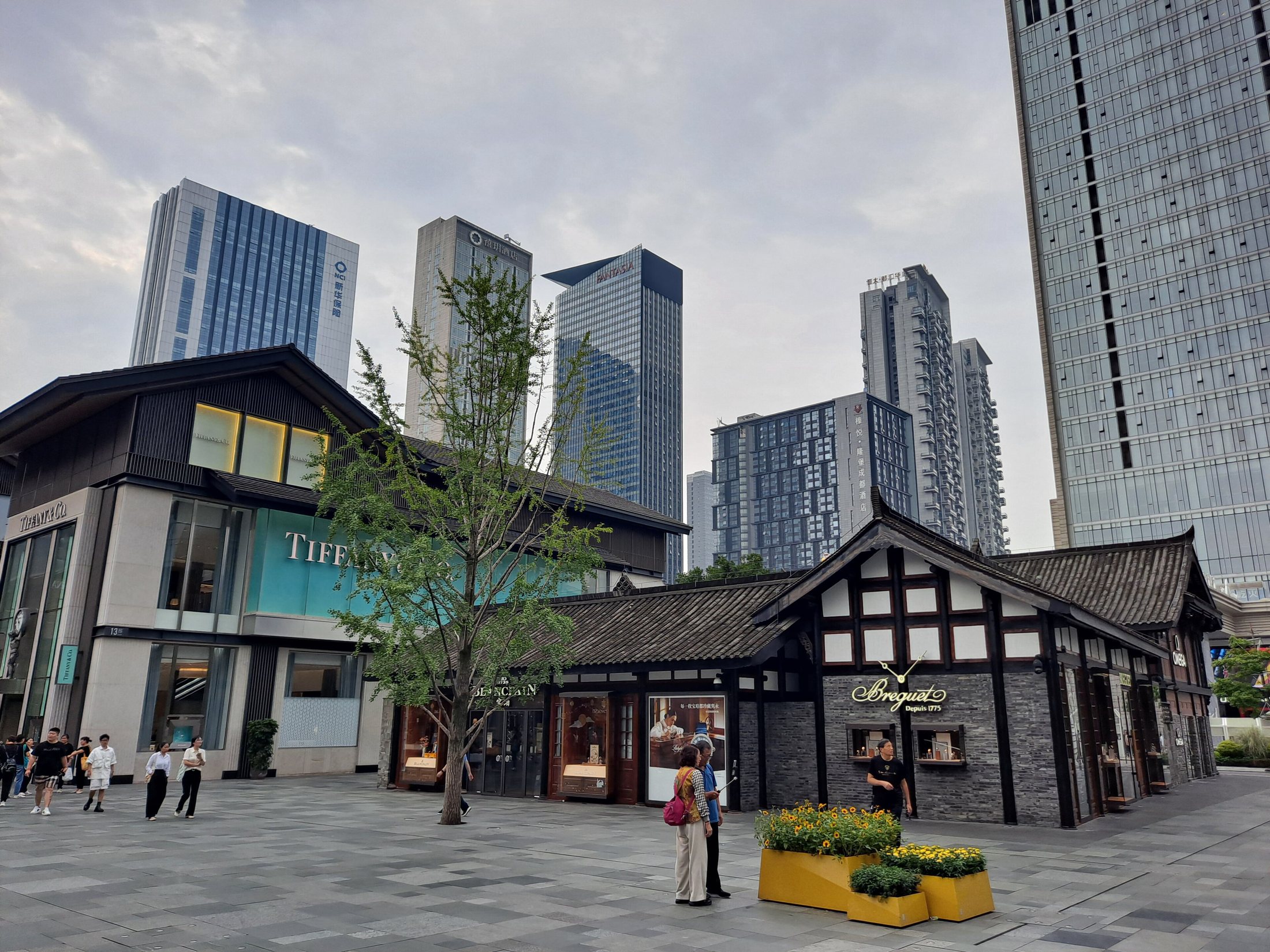 Open-air shopping lanes and modern low-rise architecture at Taikoo Li in Chengdu.