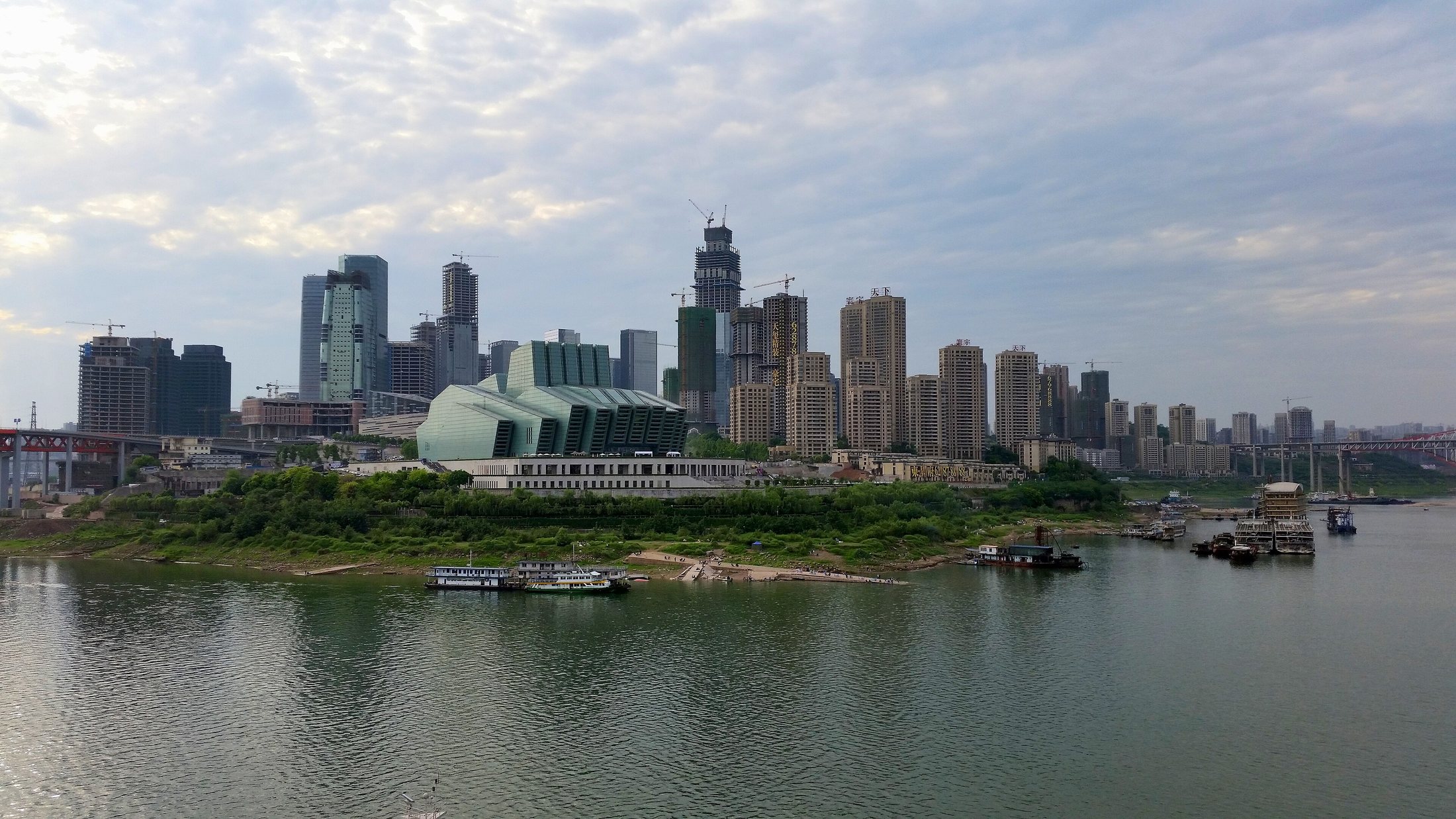 An elevated urban view of central Chongqing that fits the dramatic city perspective associated with Kuixing Building.