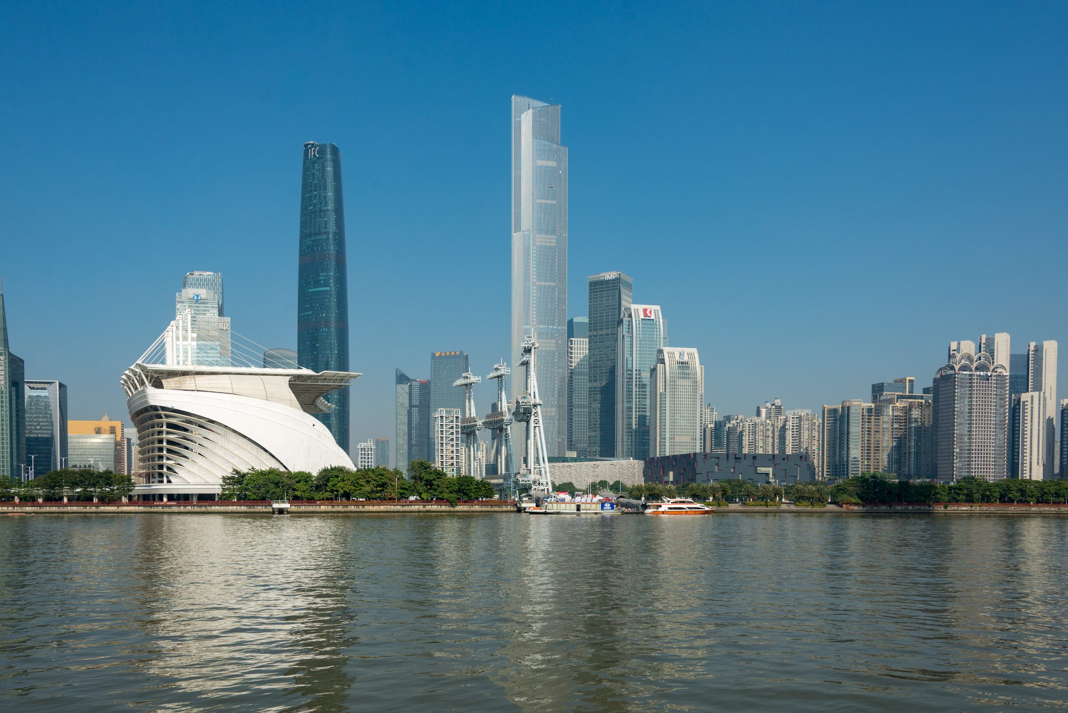 Huacheng Square in Guangzhou with the opera house and Zhujiang New Town skyline across the water.