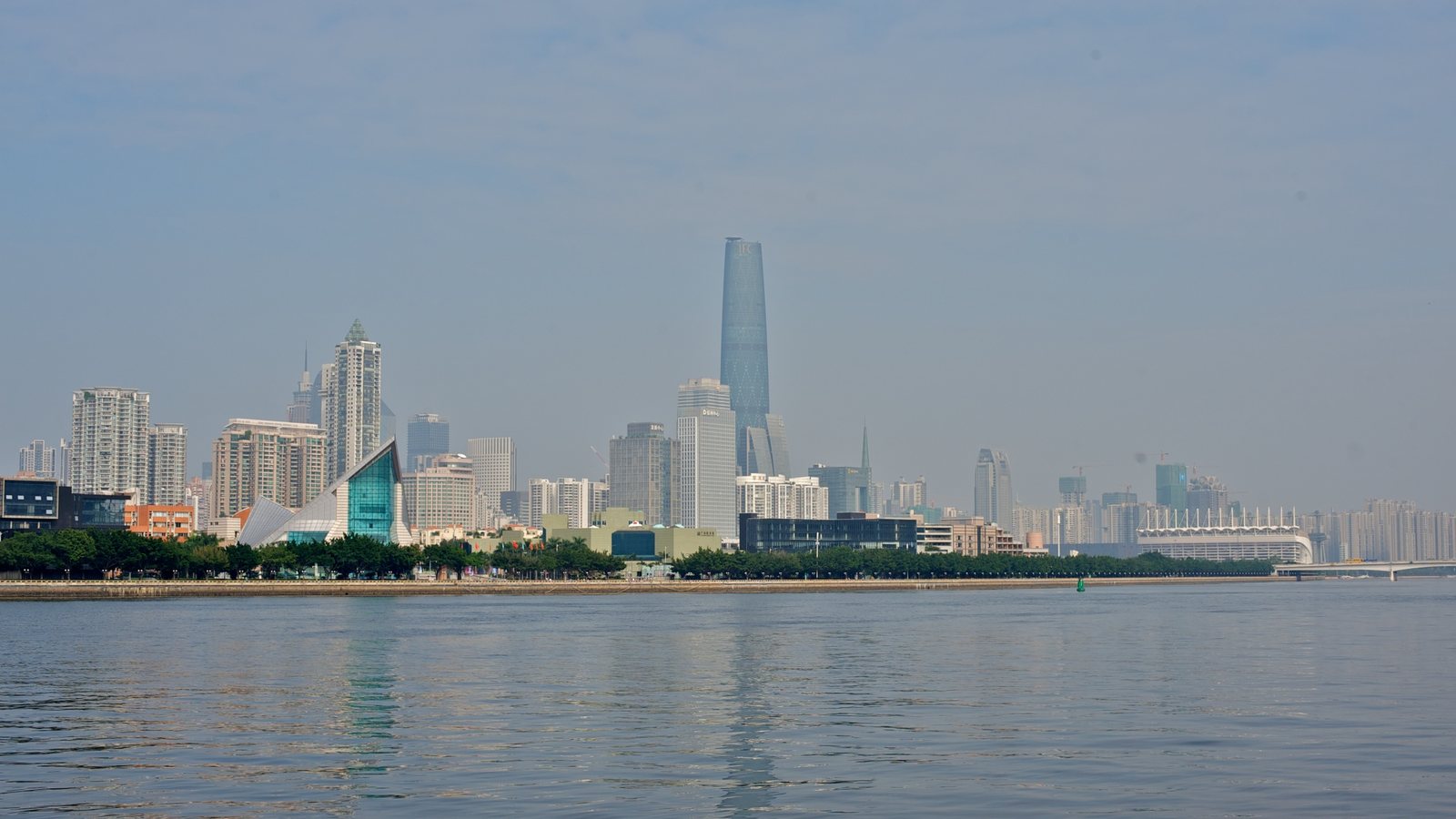 Guangzhou skyline rising beyond the riverfront.