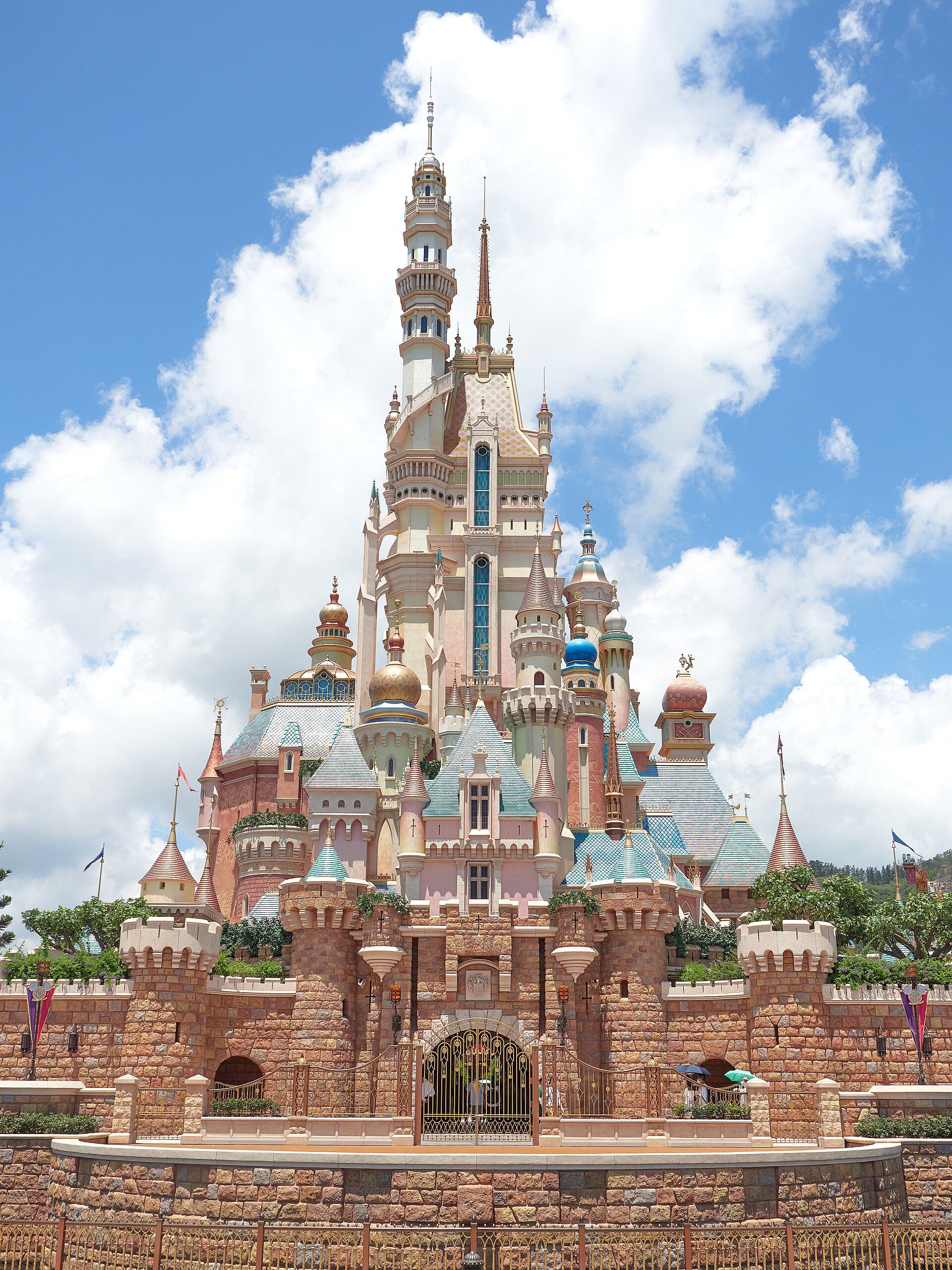 Castle of Magical Dreams at Hong Kong Disneyland under a bright sky.