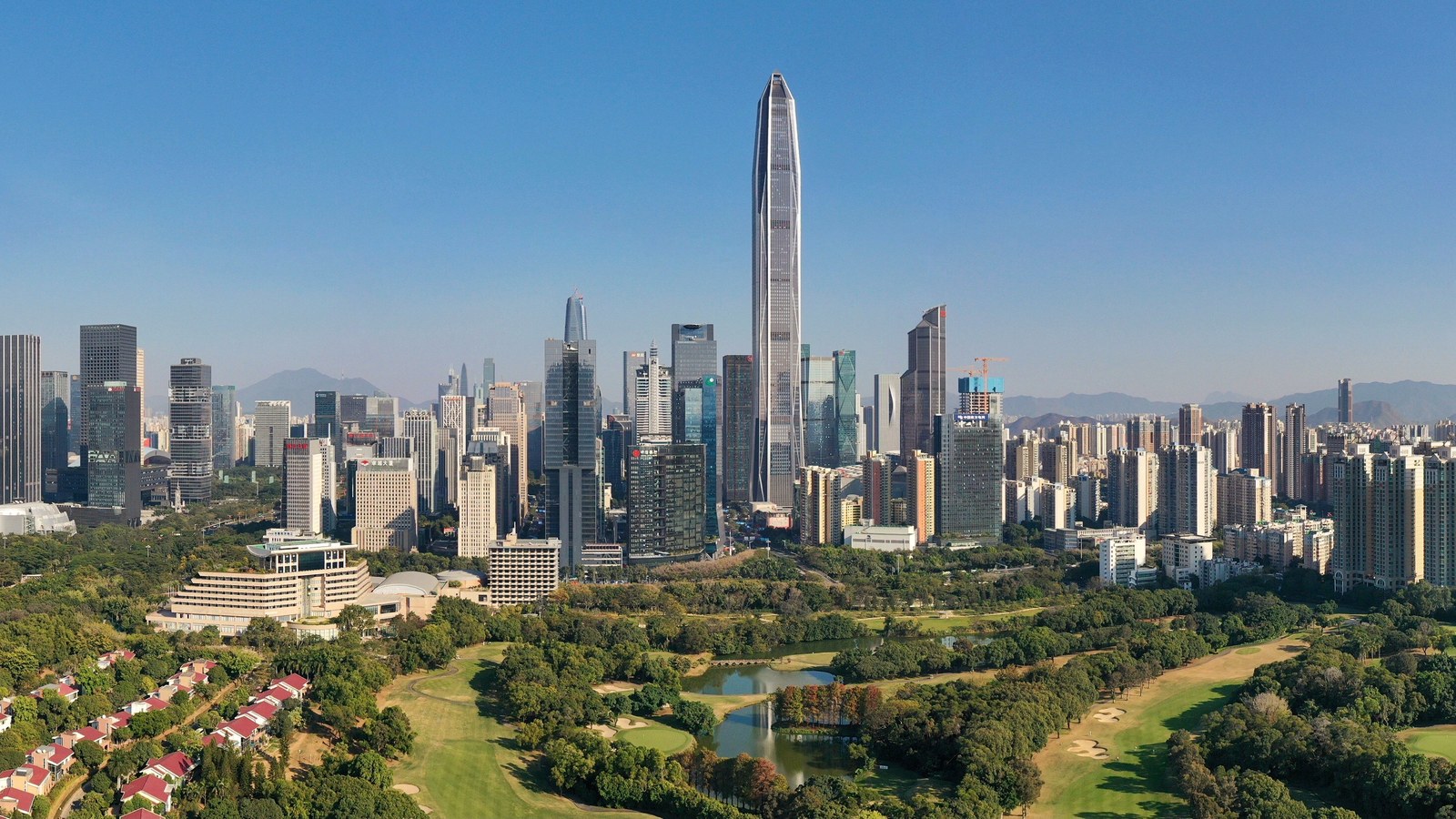 Daytime panorama of Futian in Shenzhen with the Ping An Finance Center rising above the skyline.