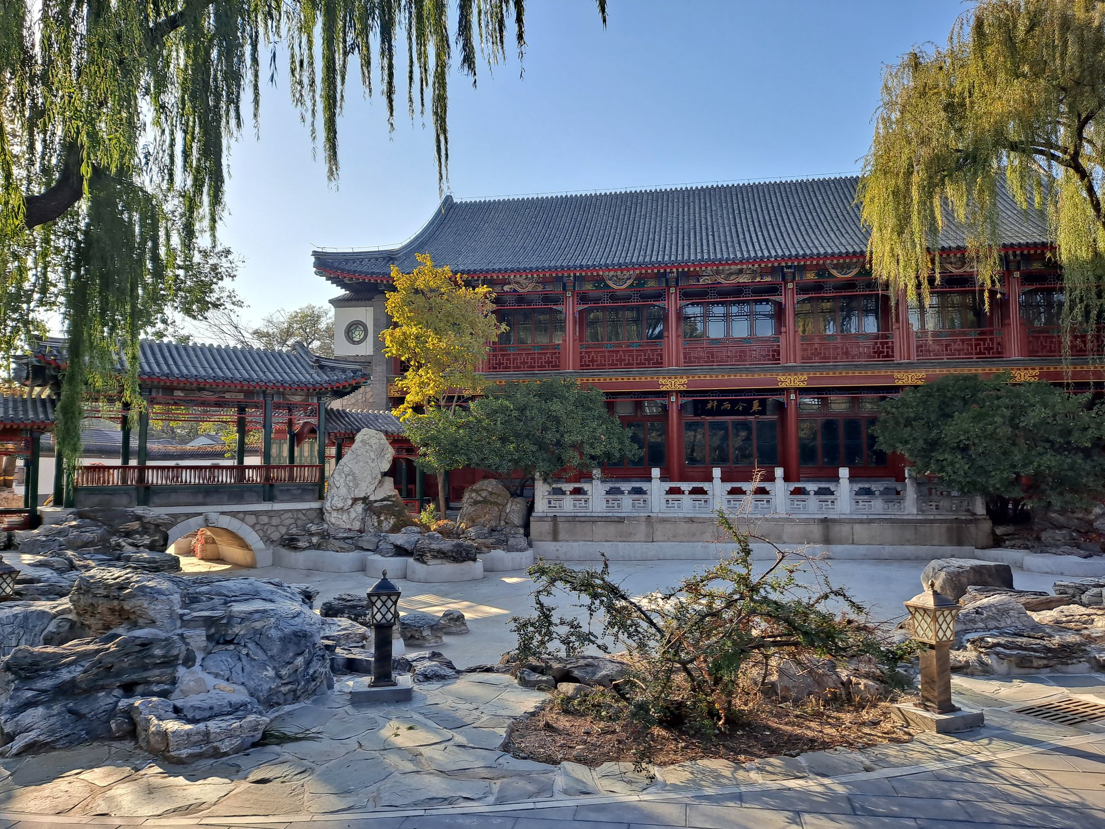 A pavilion and landscaped garden scenery inside Zhongshan Park in Beijing.