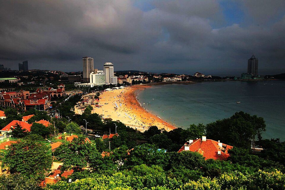 Golden sand and bright coastal water at Qingdao's No.1 Bathing Beach.
